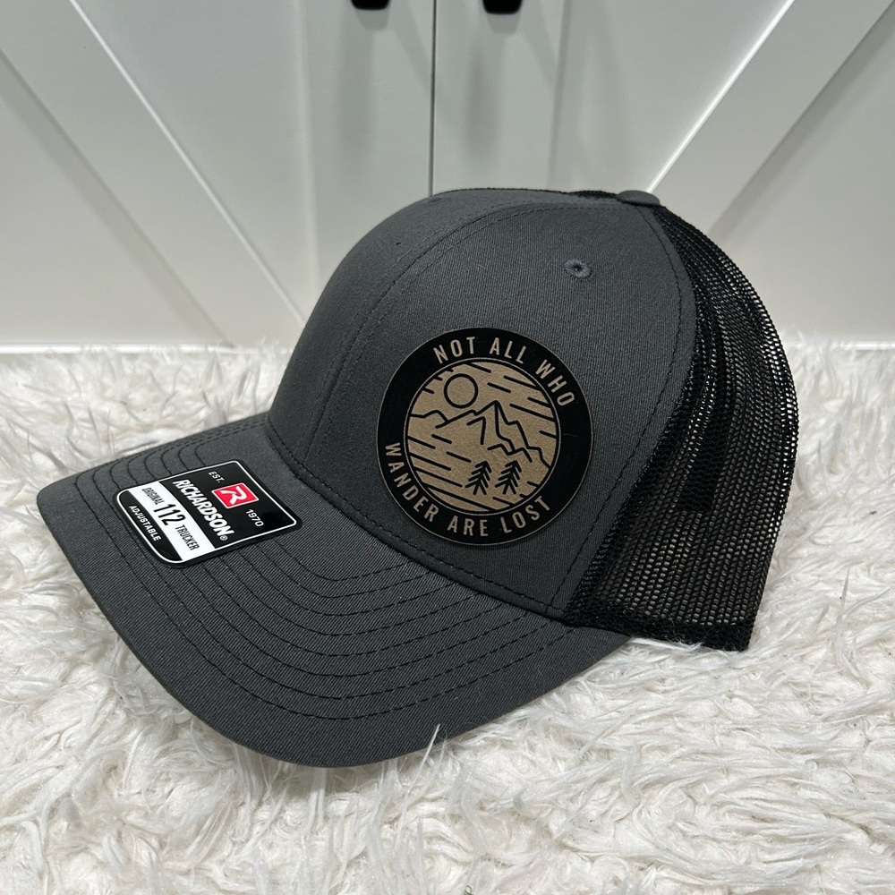 Laser engraved, Not all who Wonder are Lost. Richardson 112 trucker hat.
